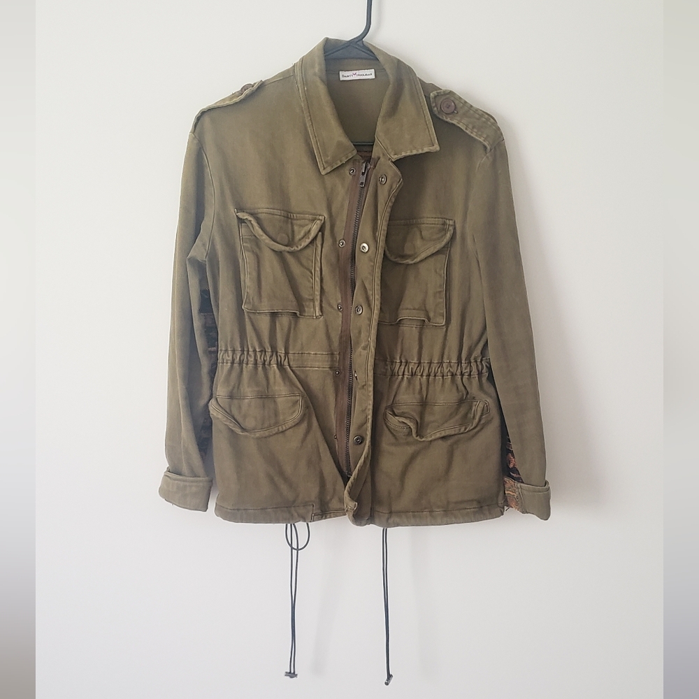 Green jacket with patterned back